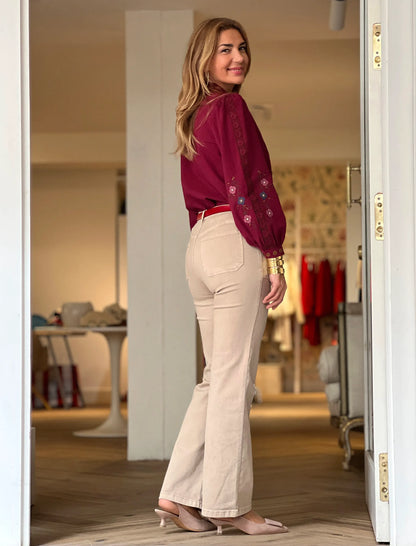 Pantalón vaquero beig talle alto