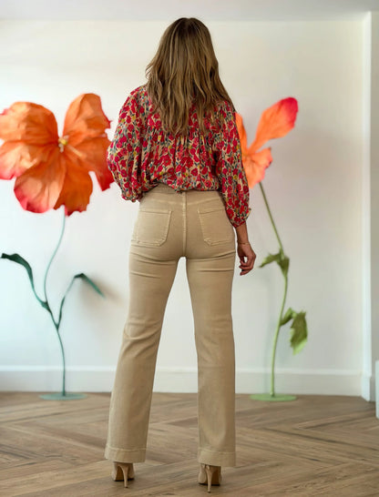 Pantalón vaquero de bolsillos beige