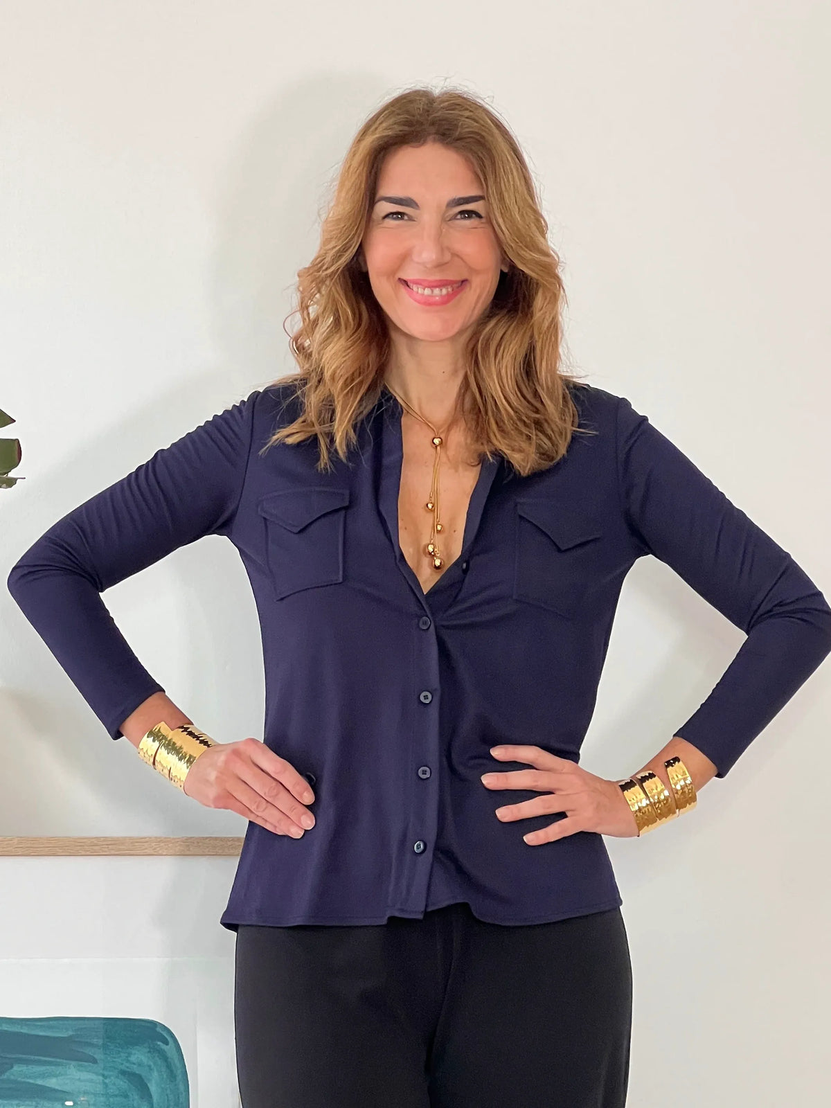 Camisa azul marino de mujer polo de bolsillos