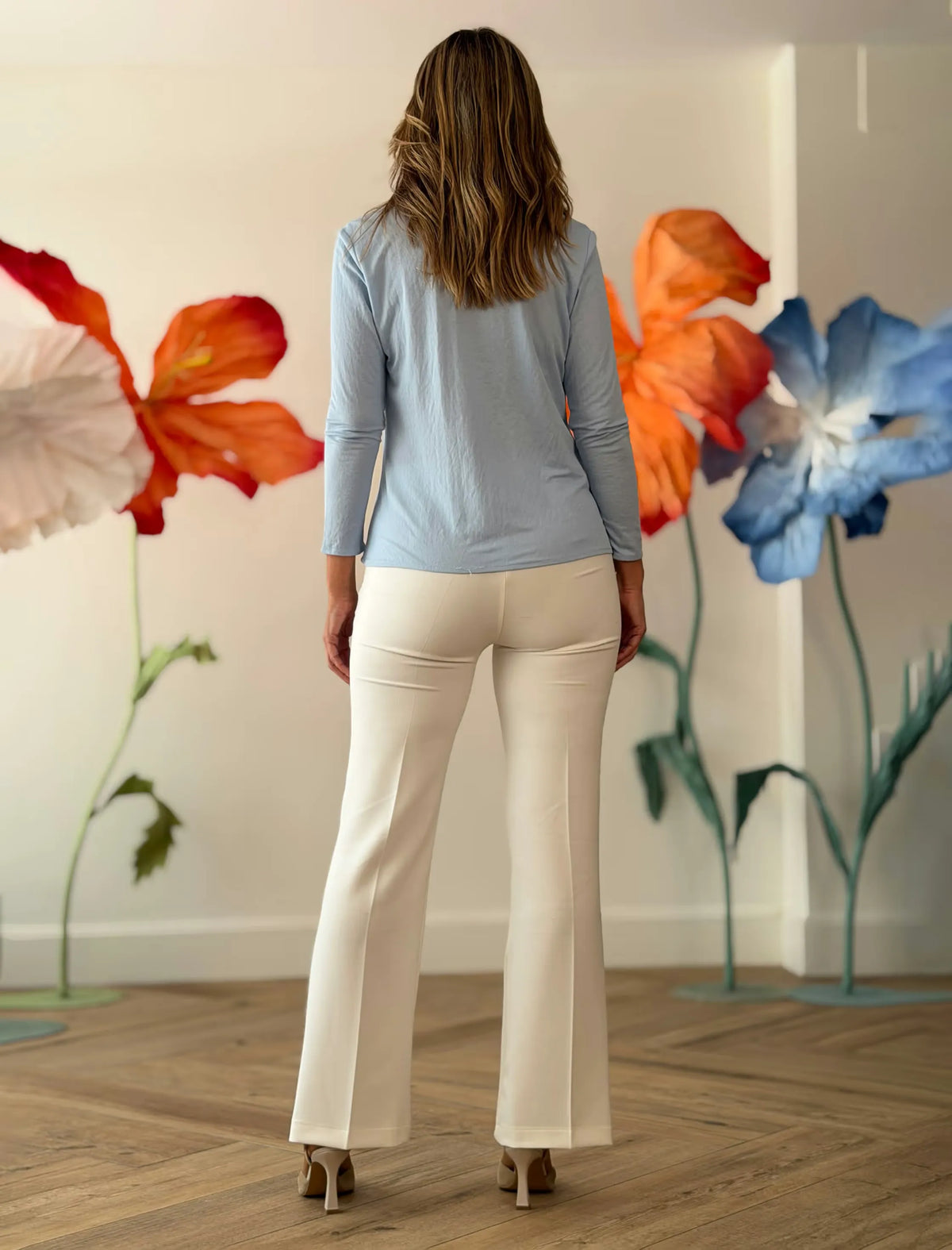Camisa azul de mujer polo de bolsillos